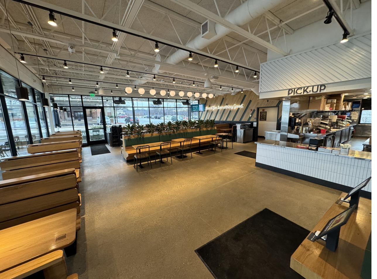 Polished concrete floor at a fast casual restaurant pick up counter