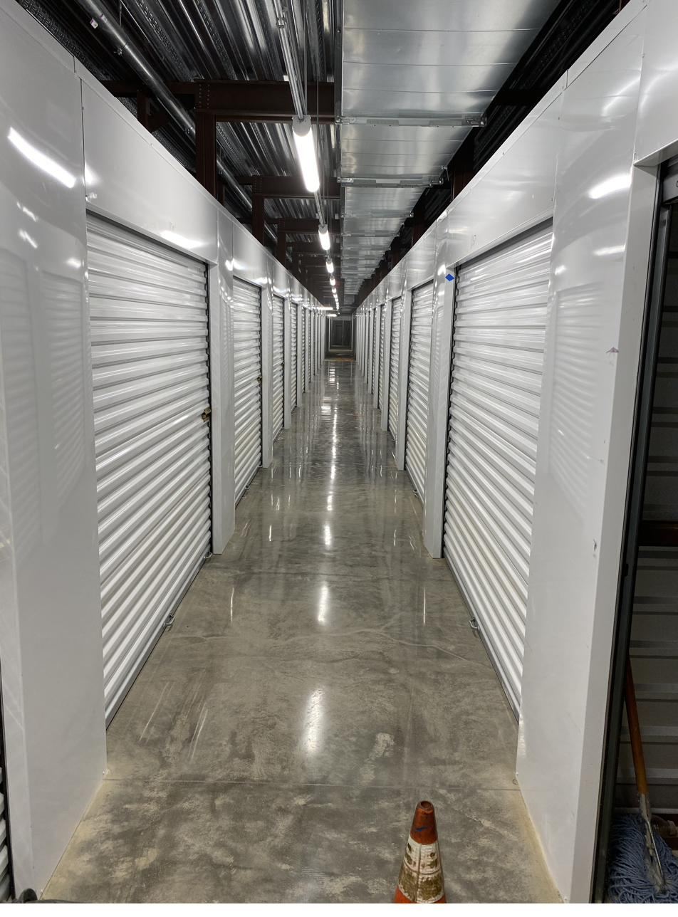 Polished concrete corridor floor in a self storage facility